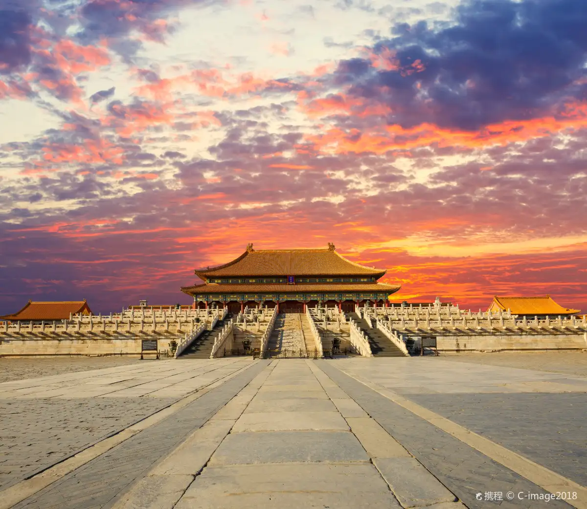 Hall of Supreme Harmony at sunset with fiery clouds